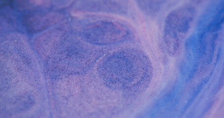 Liquid marble. Glitter wave. Purple leak with stone texture effect. Sparkling enamel of cold...