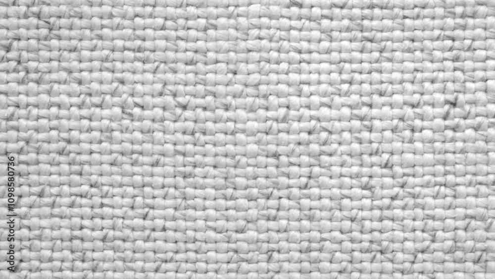 Poster A white fabric with a pattern of squares. The squares are of different sizes and are arranged in a random manner