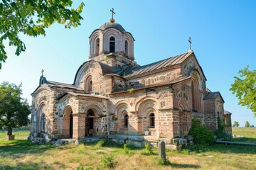 Obraz premium A historic stone church with a tall steeple standing proudly