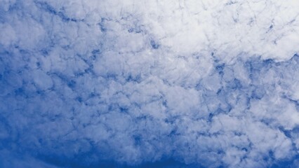 Obraz premium Marbled White Clouds in Blue Sky