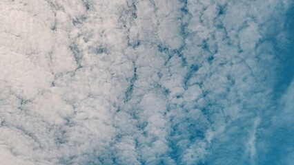 Obraz premium Marbled White Clouds in Blue Sky