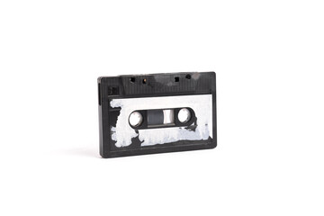 Obraz premium Old vintage audio cassette on white background.