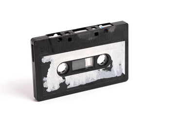 Obraz premium Old vintage audio cassette on white background.
