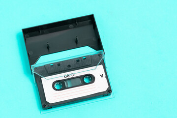 Obraz premium Old vintage audio cassette on green background.