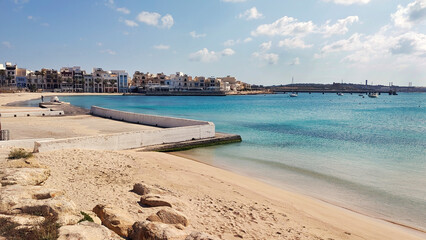 The beach of “Pretty Bay” situated in the seaside town of Birzebbuga in the south isle of Malta, Europe.