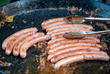 Fried sausages, street food in Kaliningrad.