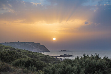 Sunset on mediterranean sea of Gallura coast in northern Sardinia island, Italy