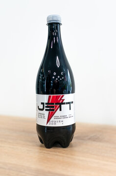 Kiev, Ukraine - November 23, 2024: PET bottle 1l of Jett energy drink on blur background Obolon production