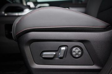 Explore the intricate functions of premium luxury car seat control buttons in detail