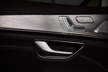 Explore the intricate functions of premium luxury car seat control buttons in detail