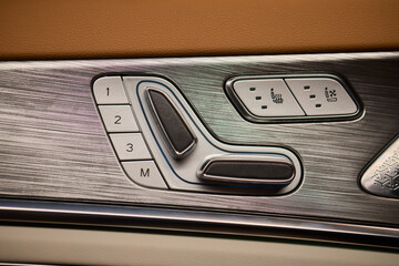 Explore the intricate functions of premium luxury car seat control buttons in detail