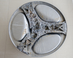 Corroded Aluminium Spider of a washing machine