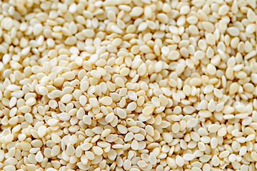 Fototapeta premium Sesame seeds background on top.