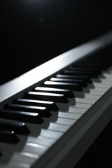 Synthesizer on black background, closeup. Electronic musical instrument
