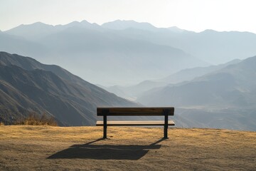 Mountain viewpoint bench offers serenity with stunning panoramic landscape under soft light