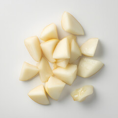 Chopped Asian pear fruit on a white background