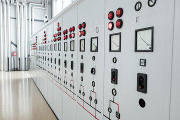 Row of Indicator Boards in the Power Plant a series of analog meters and control indicators on the...