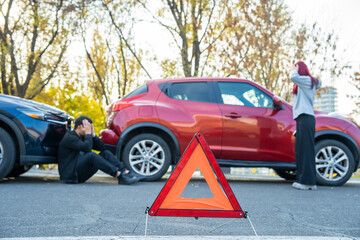 Car accident, traffic sign, desperate man