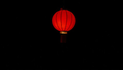 Obraz premium Traditional Red Chinese Lantern on Black Background
