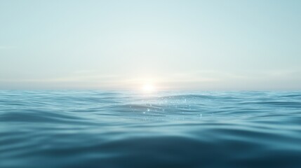Fototapeta premium The ocean is calm and the sun is setting, creating a serene