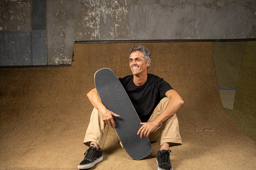 54 year old Brazilian skateboarder in a photo shoot at a skate park_19.