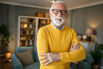 Obraz premium Portrait of one senior man with beard and gray hair happy smile