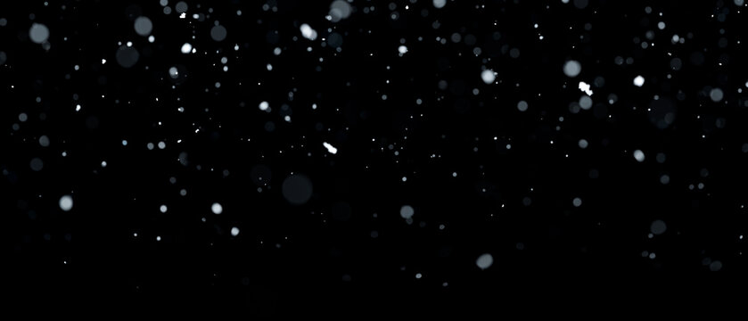 Real snowfall over black background. Abstract snowy white particles falling for winter weather overlay or cold snowfall background. Light snow storm.