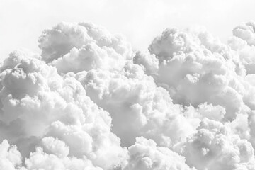 White clouds isolated on a white background. Suitable for weather illustrations, dreamy themes, and design overlays.