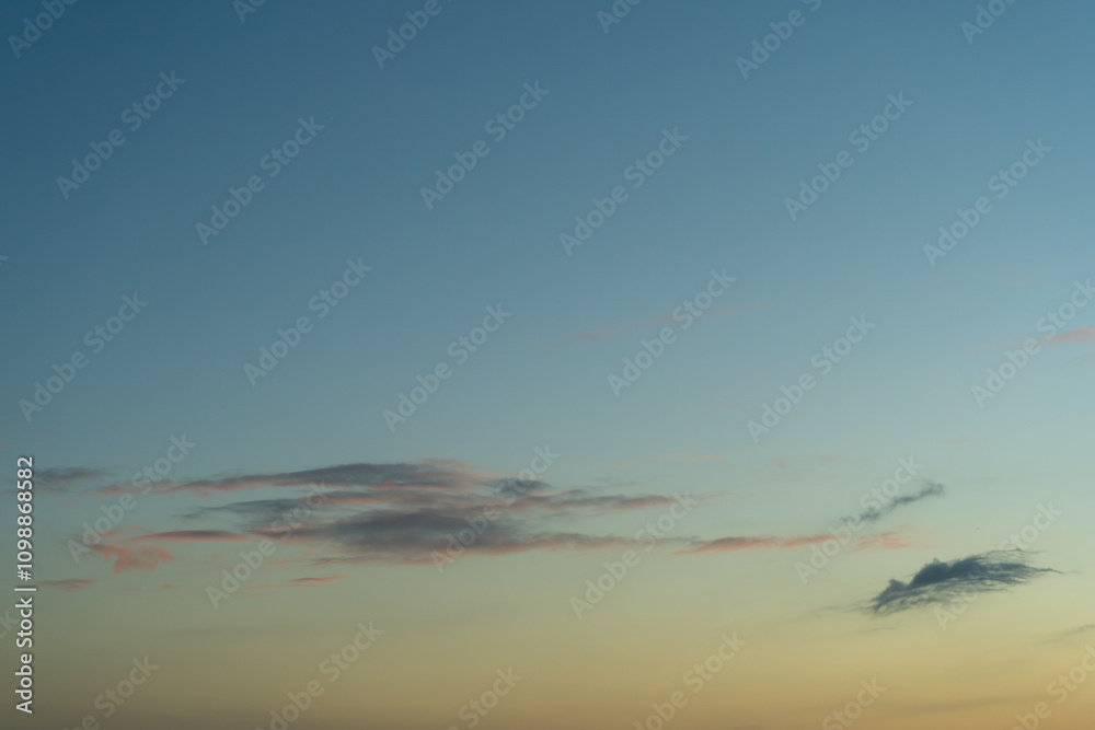 Canvas Prints sky with colorful pink and dark cirrus clouds at sunset. abstract texture background pattern.