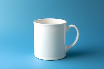 Fototapeta premium White Ceramic Mug on Blue Background