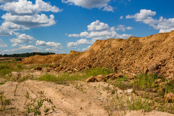 Soil waste rock dumps at a sand quarry
