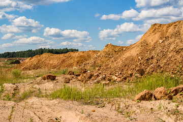 Soil waste rock dumps at a sand quarry