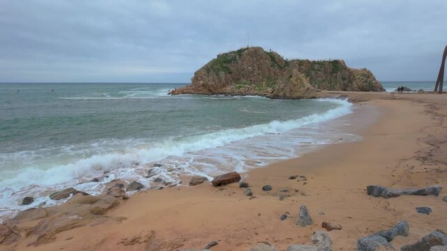 Blanes lloret de mar in the costacta brava of girona. , la palomera rock on the beach