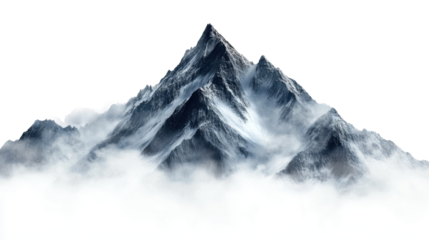 Dramatic mountain peak rising above swirling clouds in nature