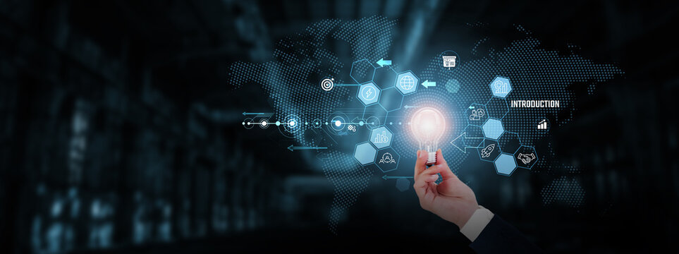 Introduction: Innovation, creativity, inspiration, new ideas, technology, breakthroughs. Businessman hand holding creative light bulb with innovative technology.