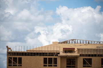 Construction site. Roof structure. Roofing Wooden House Frame. Roof at construction site. Construction builders. Industrial. Industrial background.