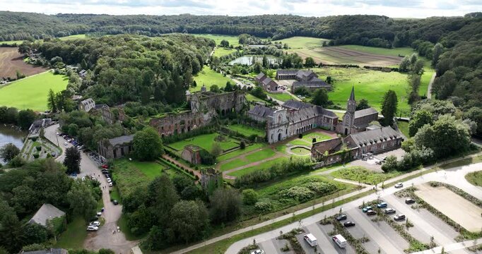 Aerial footage of the Aulne Abbey, in Thuin on the river Sambre in the Bishopric of Liege, Belgium