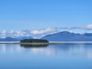 Fototapeta premium Mountains and Island in Alaskan Fjord
