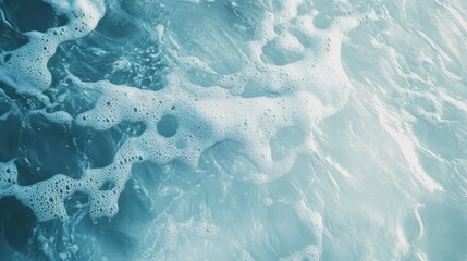 Obraz premium The water is blue and has bubbles