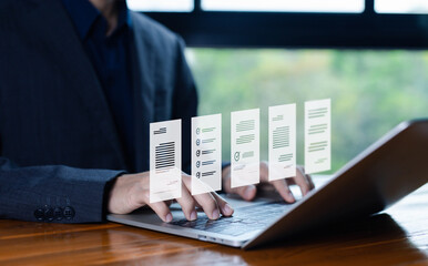 manages document data on a laptop. document files digital electronic, business paperless. software...