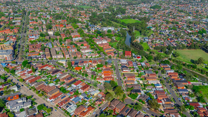 Obraz premium Panorama aerial drone view of western Sydney Suburbs of Canterbury Burwood Ashfield Marrickville Campsie with Houses roads and parks in Sydney New South Wales NSW Australia