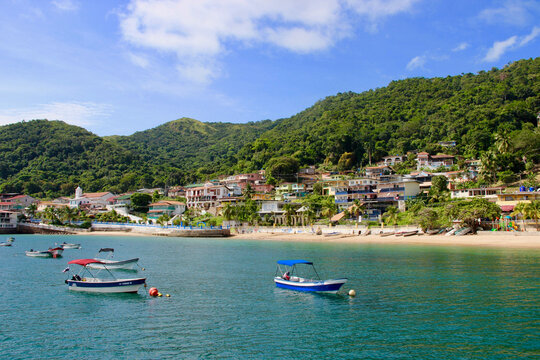 Island landscape of Isla Taboga in Panama boats on the lagoon and hilly island