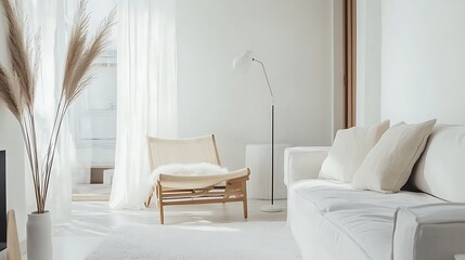 A modern white living room featuring uncluttered design, neutral accents, and sleek furniture. 