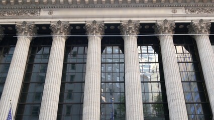 New York City, United States. Lower Manhattan Downtown Financial District urban architecture exterior. American Wall street Stock Exchange building facade columns, USA Stock Market trading. NYC FiDi.