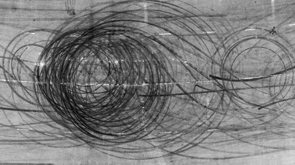 Car tire mark from car skid mark, Car tire on asphalt road race track, Texture and background car wheel tire mark on asphalt road. © Kalyakan