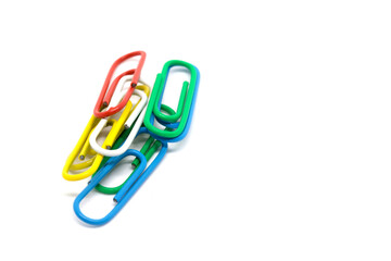 Obraz premium Colorful Paper Clips Arranged on White Background for Office Use