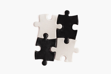 A puzzle piece with and black, sense of incompleteness and mystery