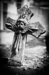 Creepy old stone cross