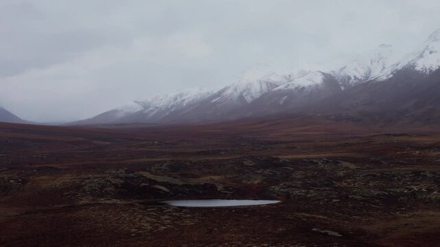 Snow-capped Mountains Near Dempster Highway In Canada - Drone Shot