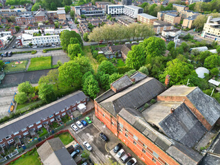 Aerial View of Buildings at Greater Manchester Central City, Northwest of England, United Kingdom. Aerial View Footage Was Captured with Drone's Camera on May 4th, 2024 During Sunset Time.
